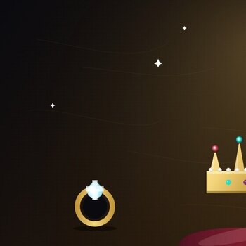 Couronne royale or et rubis sur coussin velours avec bague diamant et coupe champagne